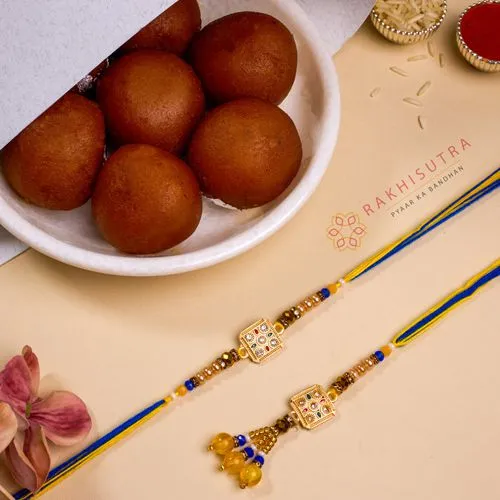 Elegant Kundan Bhai Bhabhi Rakhi N Sweet Treat Combo