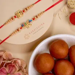 Elegant Rakhi Duo  N  Festive Sweet Box