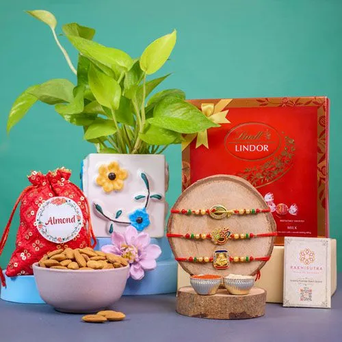 Om Krishna Ganesha Rakhi  N  Gourmet Delight Package